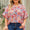 Plus Size Printed Notched Neck Half Sleeve Top